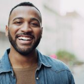 Portrait of a handsome young man in the city